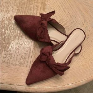 Women’s burgundy slide-on flats with bow detail